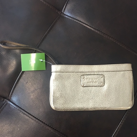 kate spade Handbags - Kate Spade Champagne / Gold Wristlet Clutch